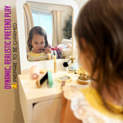 Montessori Mama wooden hairbrush encourages fine motor skills during pretend styling