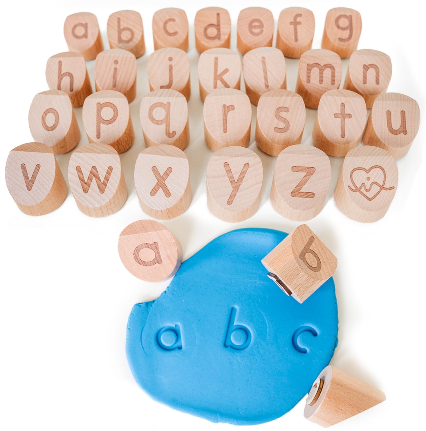 Montessori & Me Alphabet Stamps reveal lowercase letters for hands-on clay play and early recognition.
