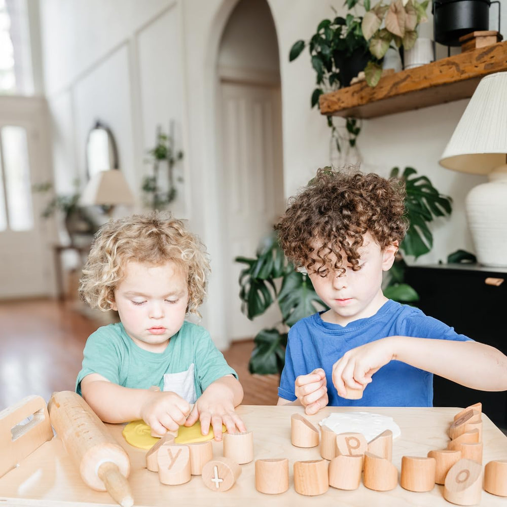 Montessori & Me Alphabet Stamps packaging doubles as storage for clutter-free play.