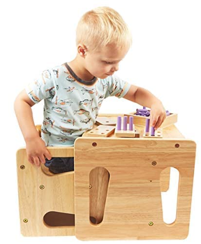 Child uses Montessori & Me Counting Peg Board for counting practice with pegs.