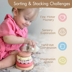 Moonkie Bunny stacker in small hands demonstrates early stacking and hand-eye coordination.
