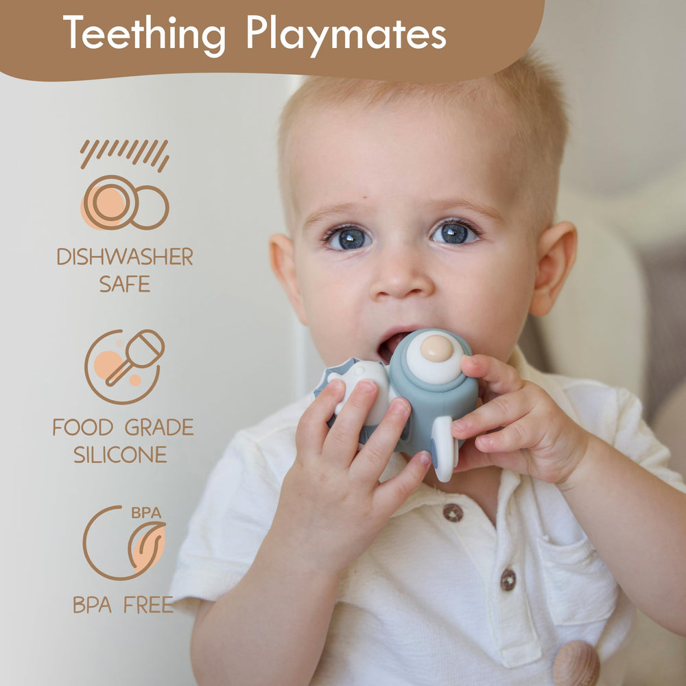Moonkie silicone rings provide safe teething texture for early grip practice.
