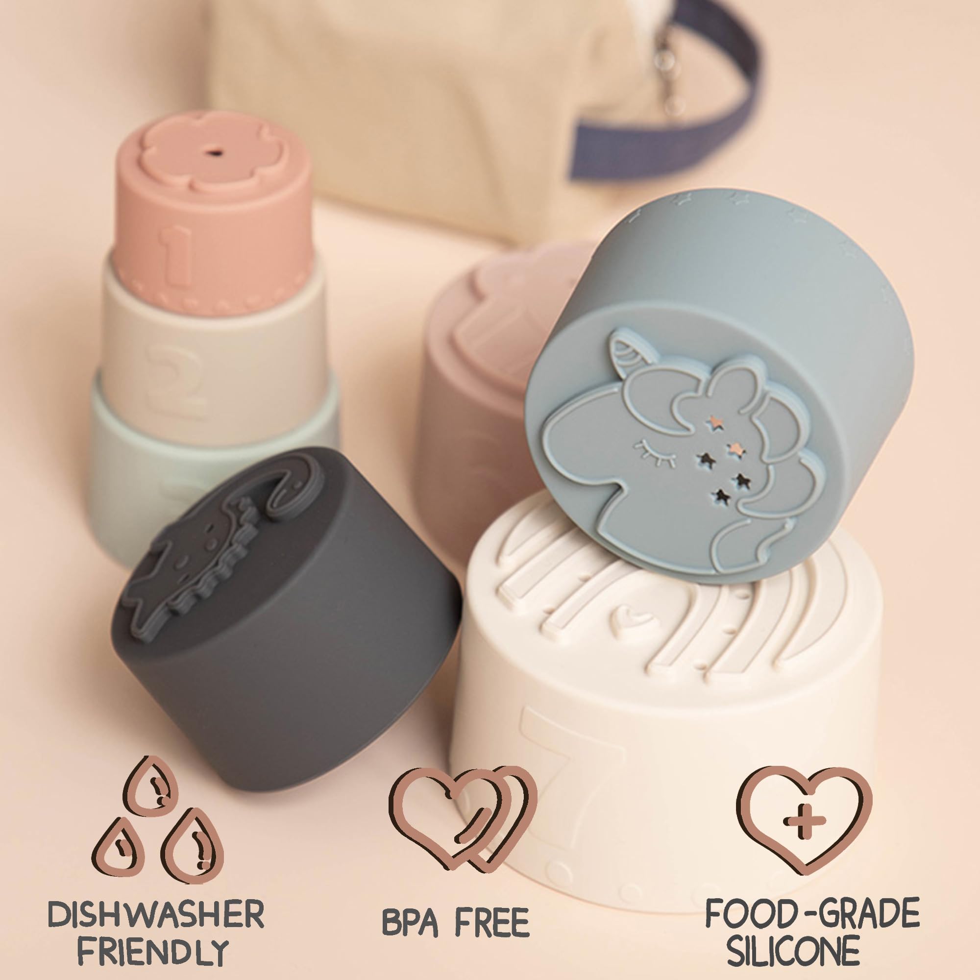 Moonkie cups designed for water play with bottom holes to encourage cause-and-effect play.