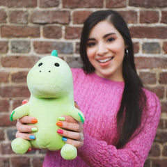 Moriah Elizabeth Pickle Plushie smiling dinosaur view, ideal as a collectible.