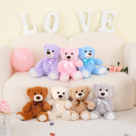 Soft plush MorisMos bears in rainbow colors for decorative room accents.