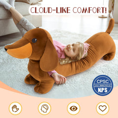 MorisMos dachshund plush on sofa serves as charming decor piece.
