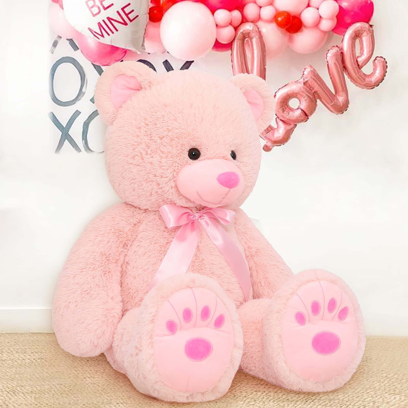 MorisMos pink teddy bear ribbon detail adds an elegant gift touch.