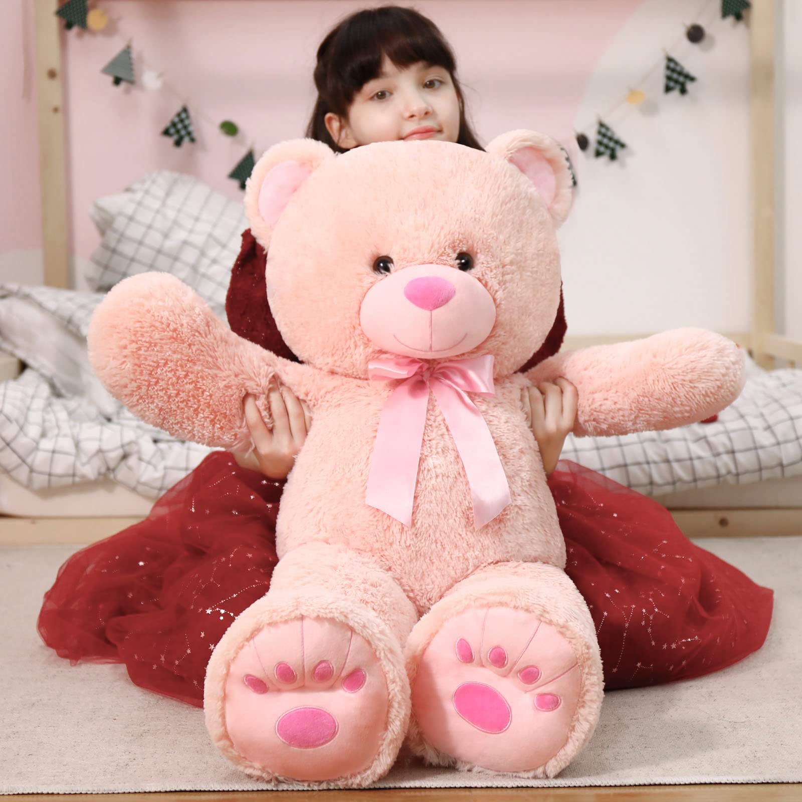 MorisMos pink teddy bear safety eyes are securely attached for kid-safe play.
