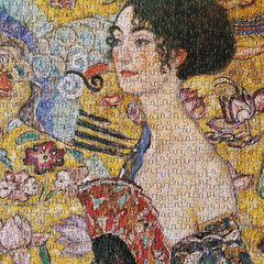 Moruska Lady with Fan puzzle assembly scene for family or solo relaxation.