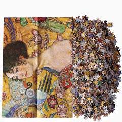 Moruska Lady with Fan puzzle pieces spread inviting collaborative and focused play.
