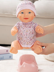 Mother Love Interactive Baby Doll drinking action demonstrates realistic feeding play.