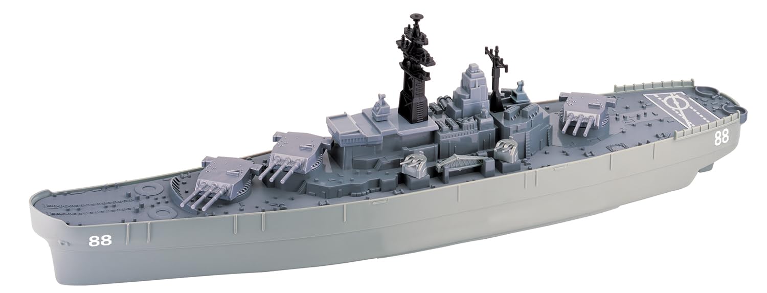 Motormax USS Giant Battleship diecast aircraft hovering above the deck for action scenes.