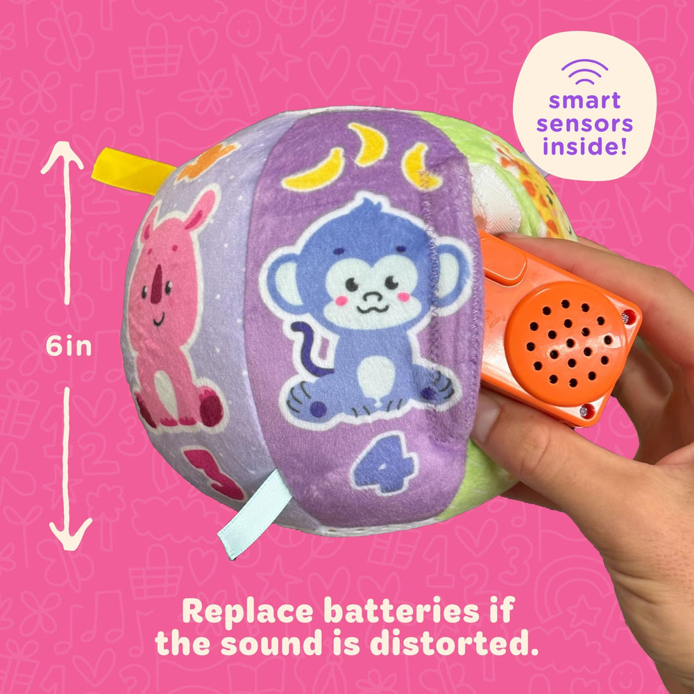 Move2Play pastel ball with music prompts engaging sensory play.