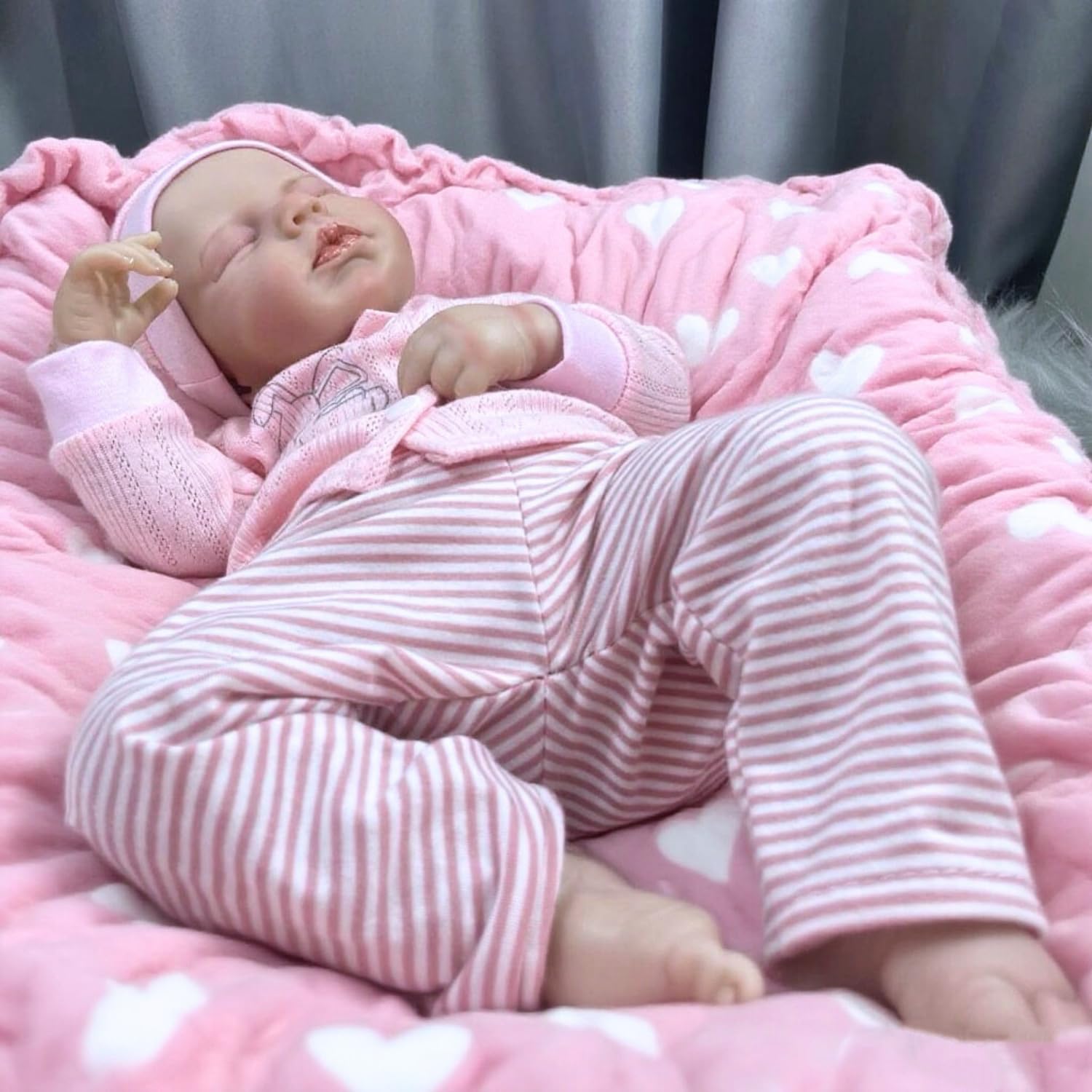 MRB Lifelike Reborn doll wears hat and striped pants