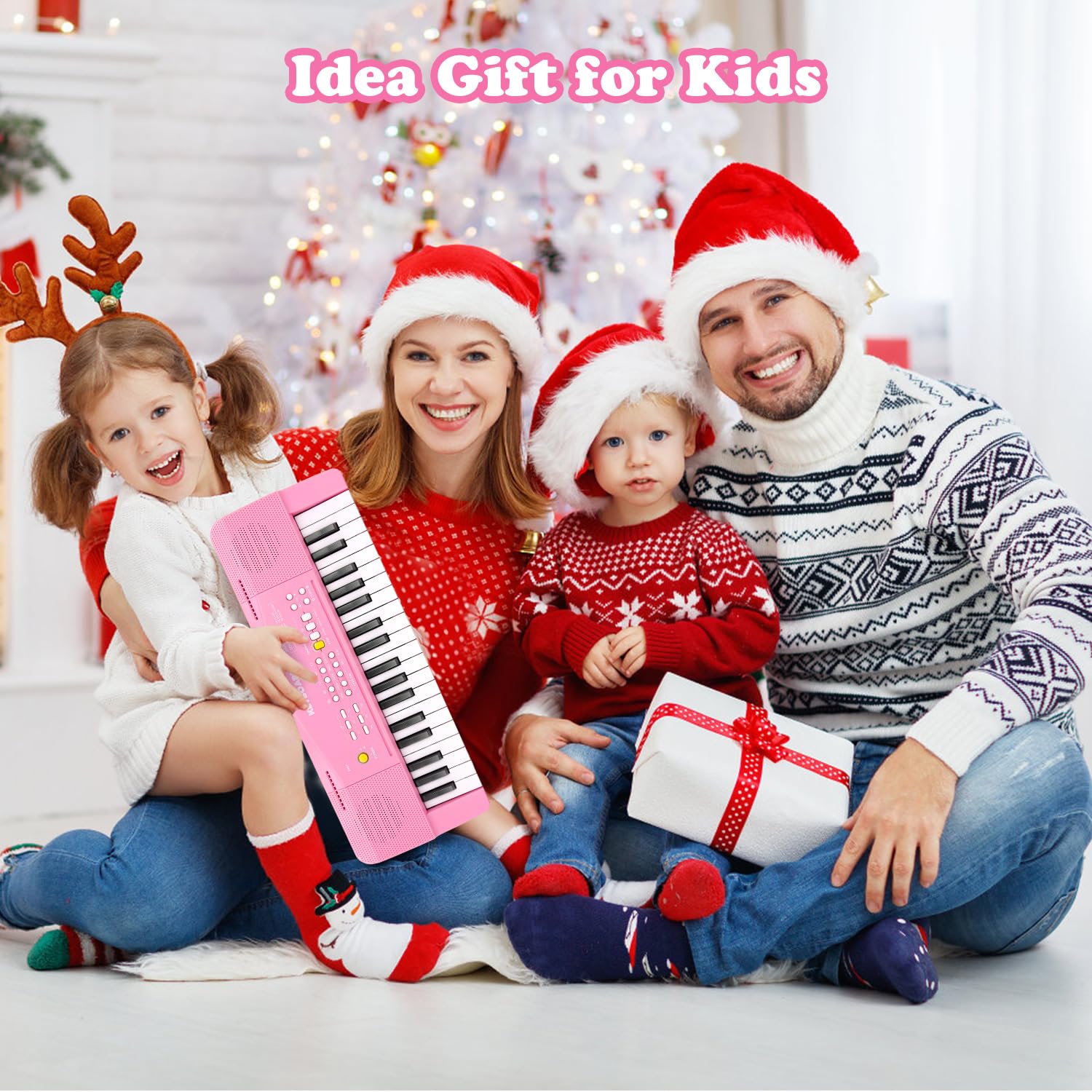 M SANMERSEN toy piano pink in-use scene with a child playing happily.