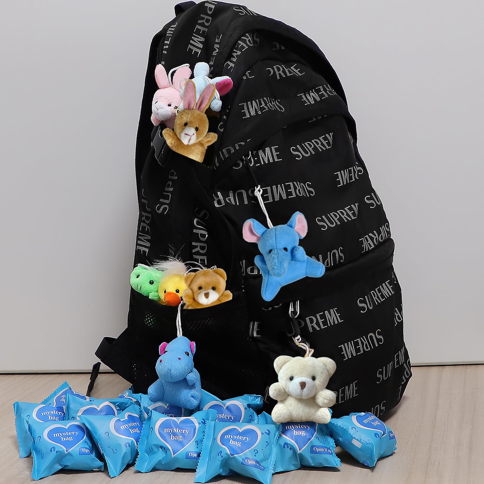 MTNSPTCR Blind Bag Mini Plush Animal backpack display, ready for carry-along fun