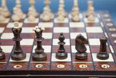 Inside Muba chess set, compartments store pieces neatly for quick setup