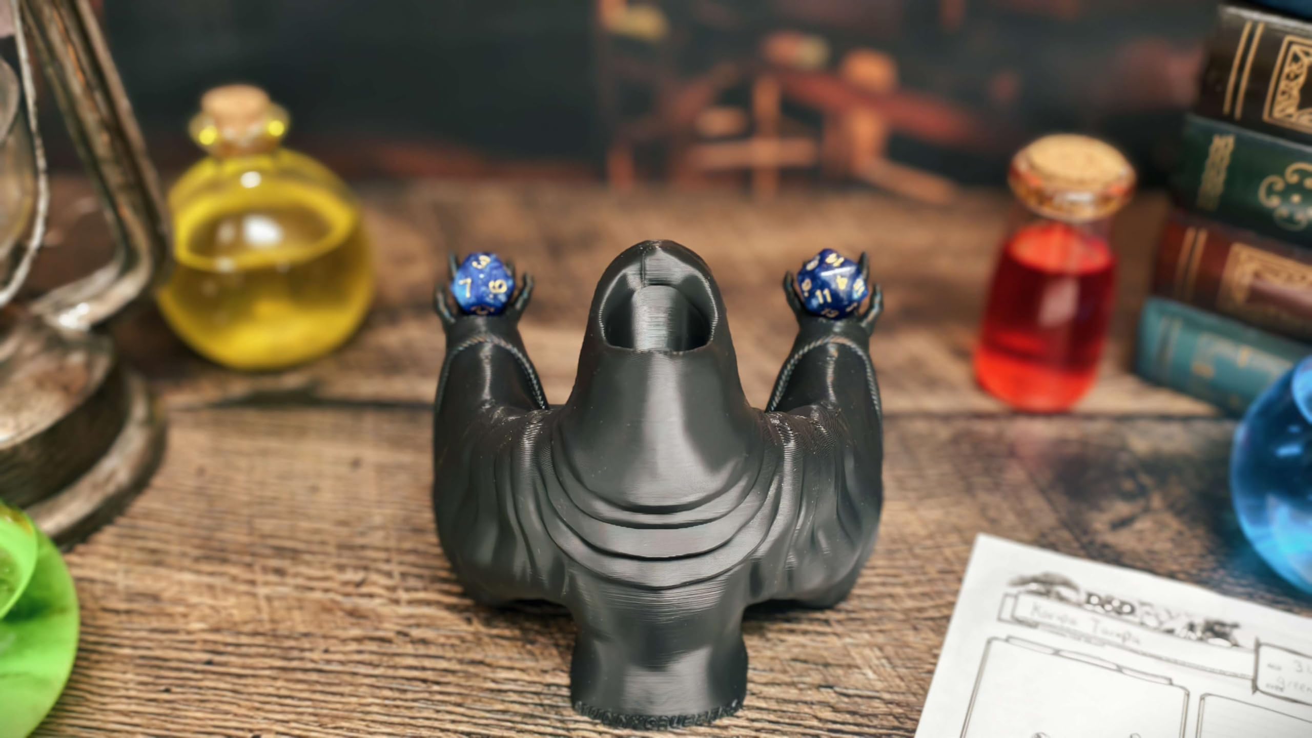 MunnyGrubbers Grim Reaper dice tower doubles as campaign decor and conversation starter.