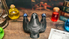MunnyGrubbers Grim Reaper dice tower doubles as campaign decor and conversation starter.