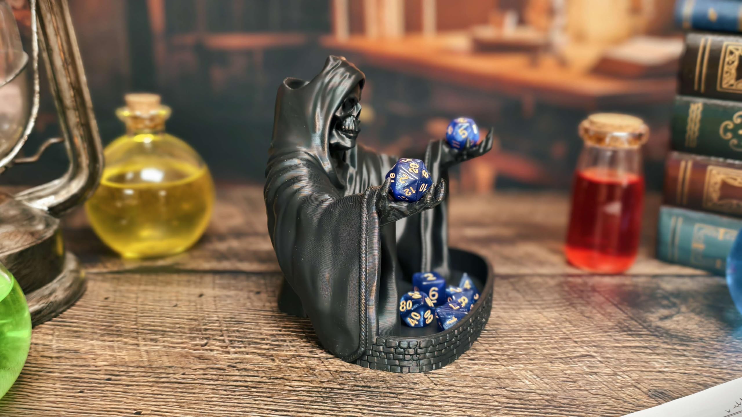 MunnyGrubbers Grim Reaper dice tower landing tray holds up to five dice for quick results.