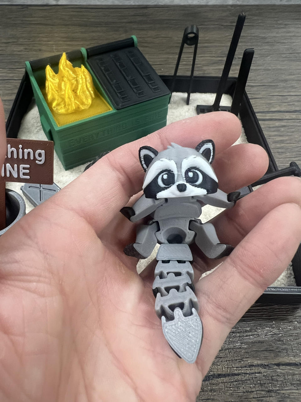 MunnyGrubbers Dumpster Fire Zen Garden on desk for focused, relaxing moments.