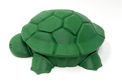 MunnyGrubbers turtle shell interior showing safe sand storage and organization.