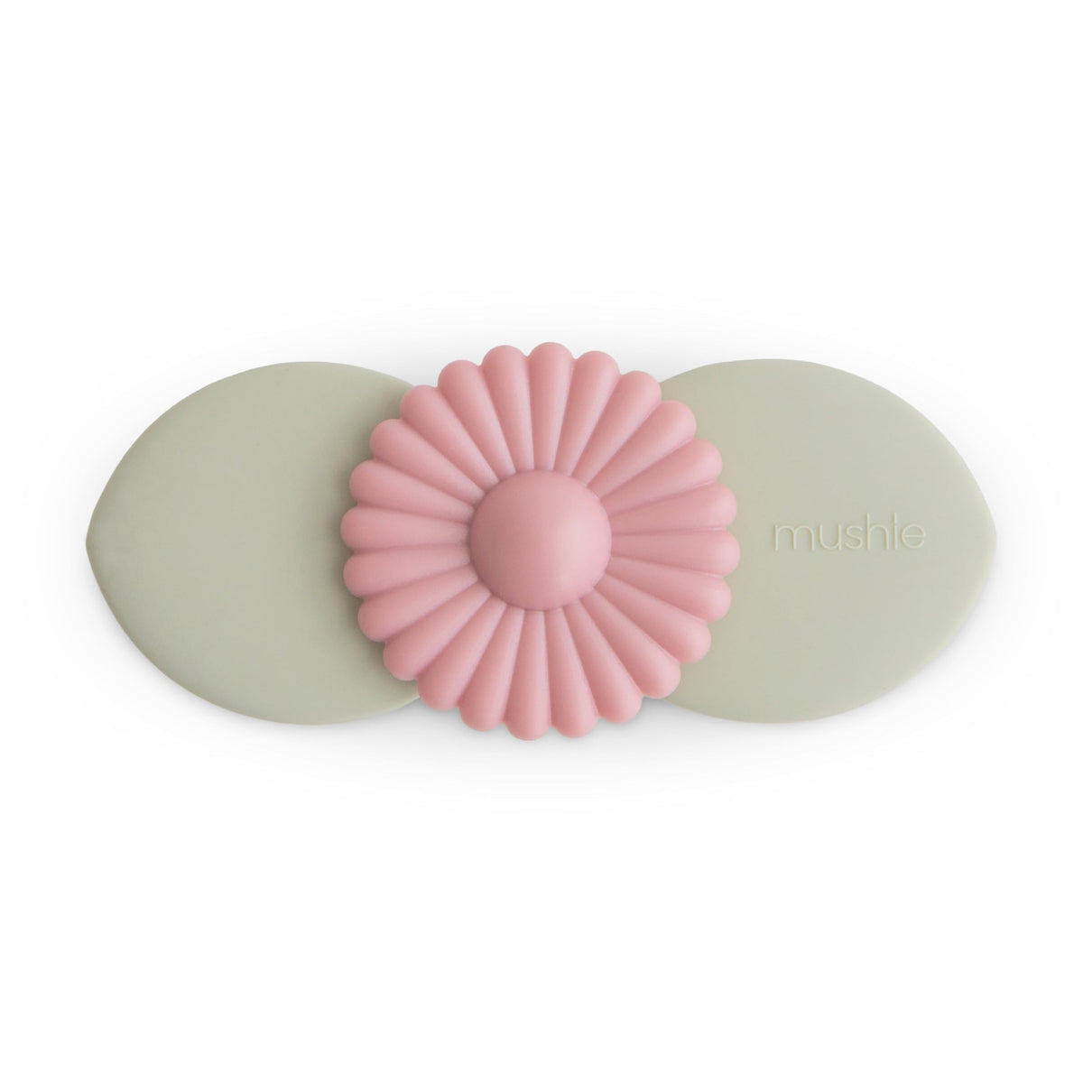 Mushie Blossom suction spinner toy on bath tub surface with spinning leaves for bath time exploration