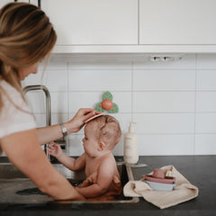 Mushie Dino Suction Spinner Toy safe 100% silicone for little hands