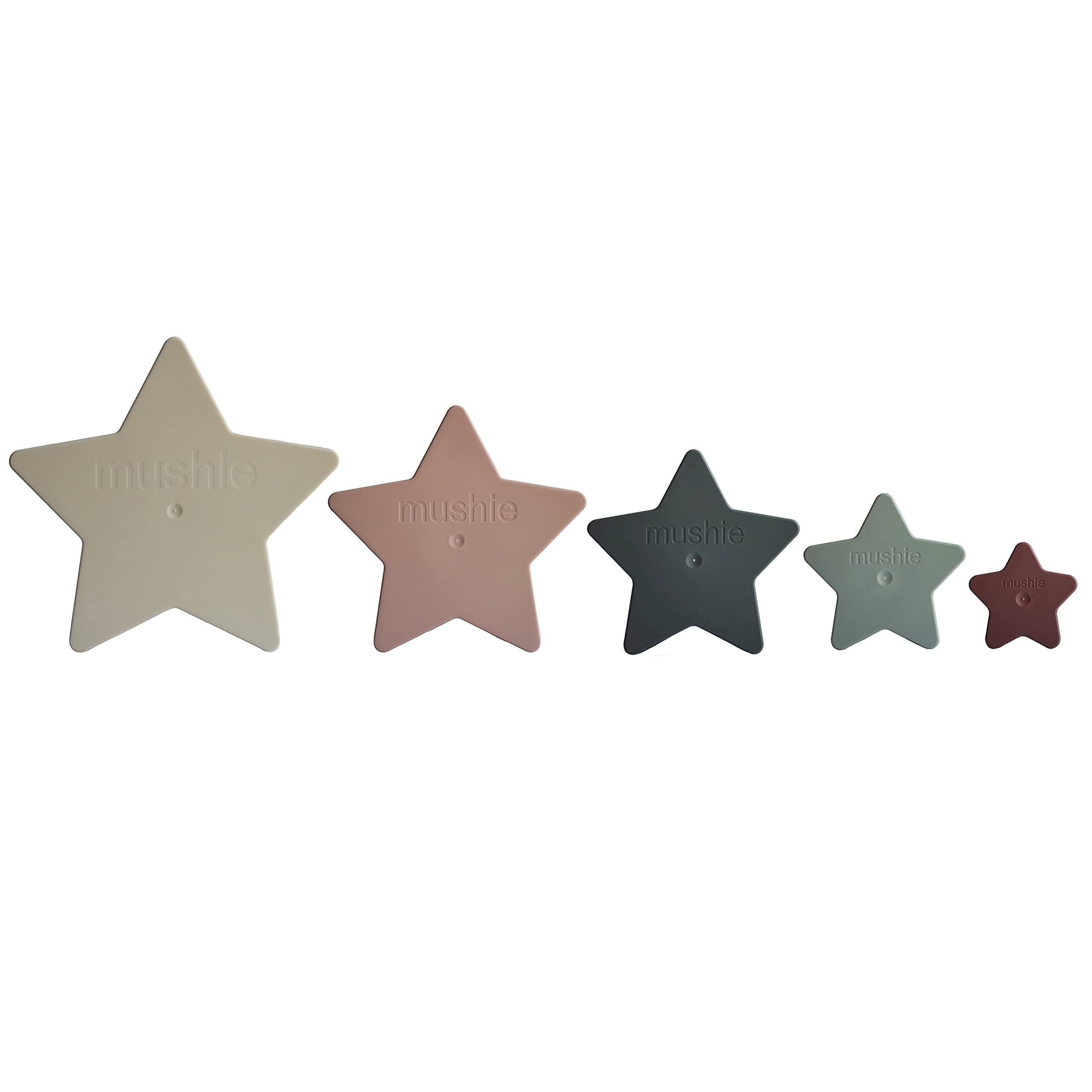 Mushie Nesting Stars Toy nesting set with soft colors encourages sorting play.