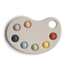 Mushie Paint Palette Press Toy close-up of silicone bubbles for sensory exploration.