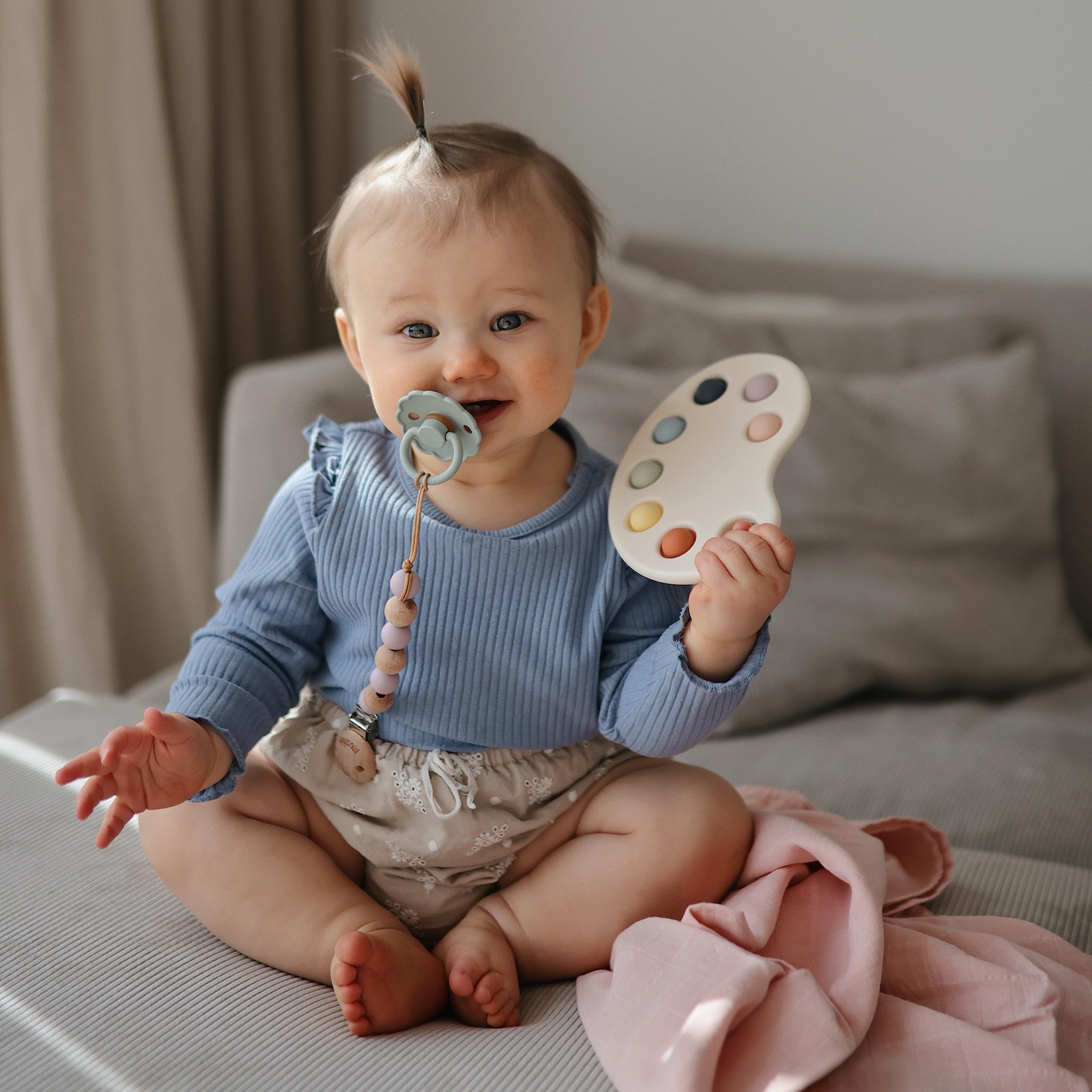 Mushie Paint Palette Press Toy uses 100% food-grade silicone for safety.