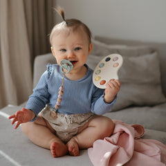 Mushie Paint Palette Press Toy uses 100% food-grade silicone for safety.