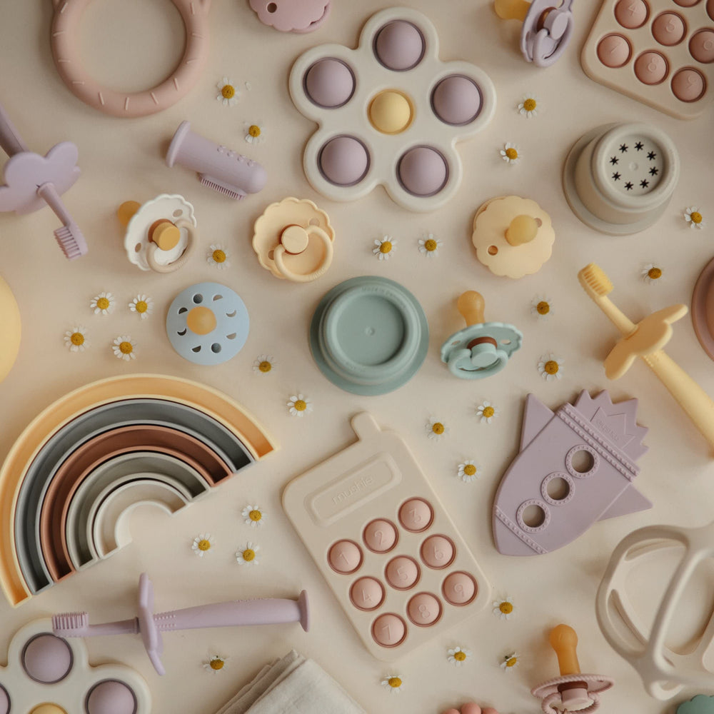 Mushie Phone Press Toy Blush features safe silicone surface for curious exploration