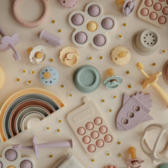 Mushie Phone Press Toy Blush features safe silicone surface for curious exploration
