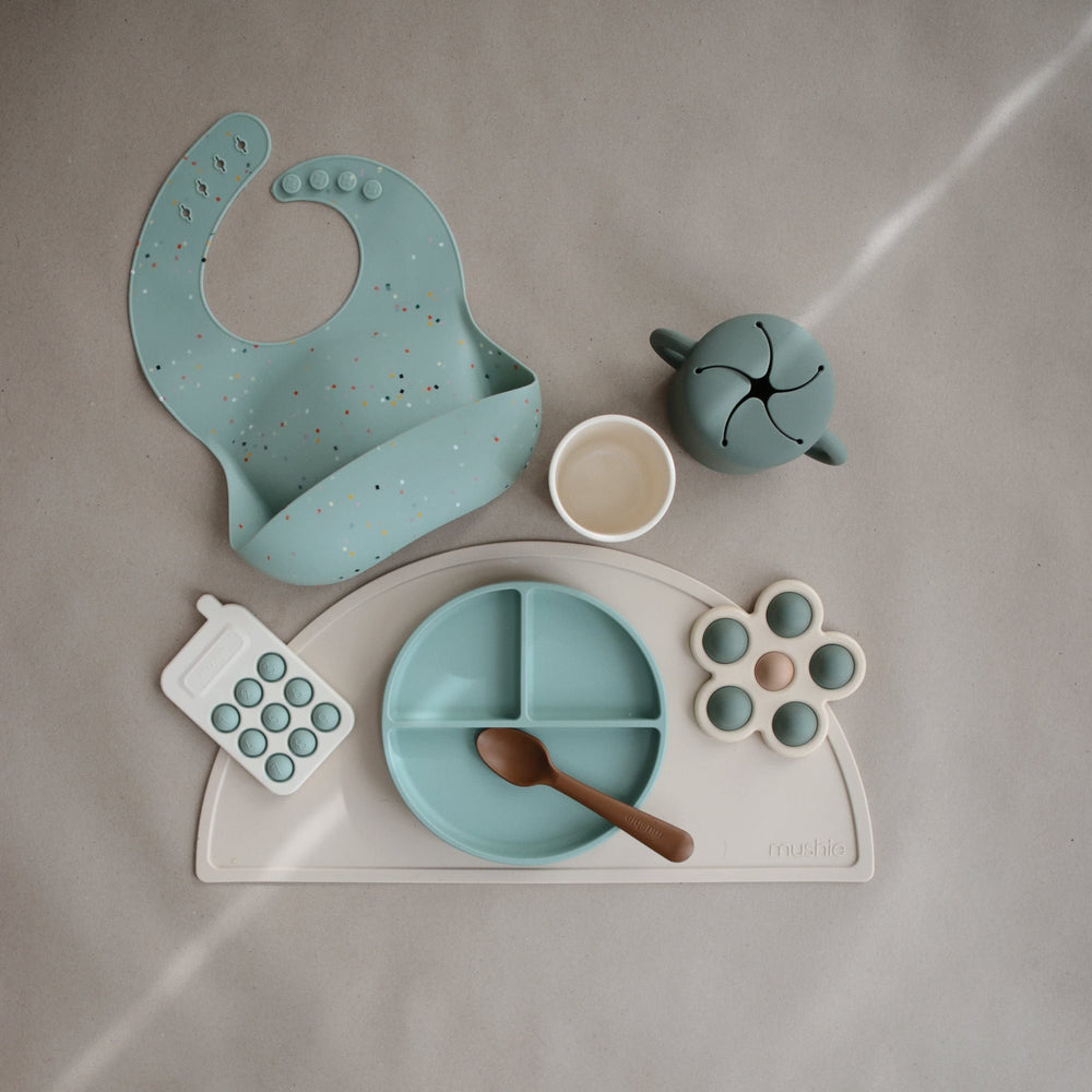 Mushie Phone Press Toy Cambridge Blue made with safe, BPA-free materials.