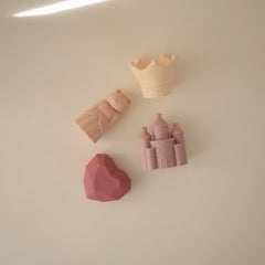 Mushie Princess castle bath toy sparks storytelling and pretend play.