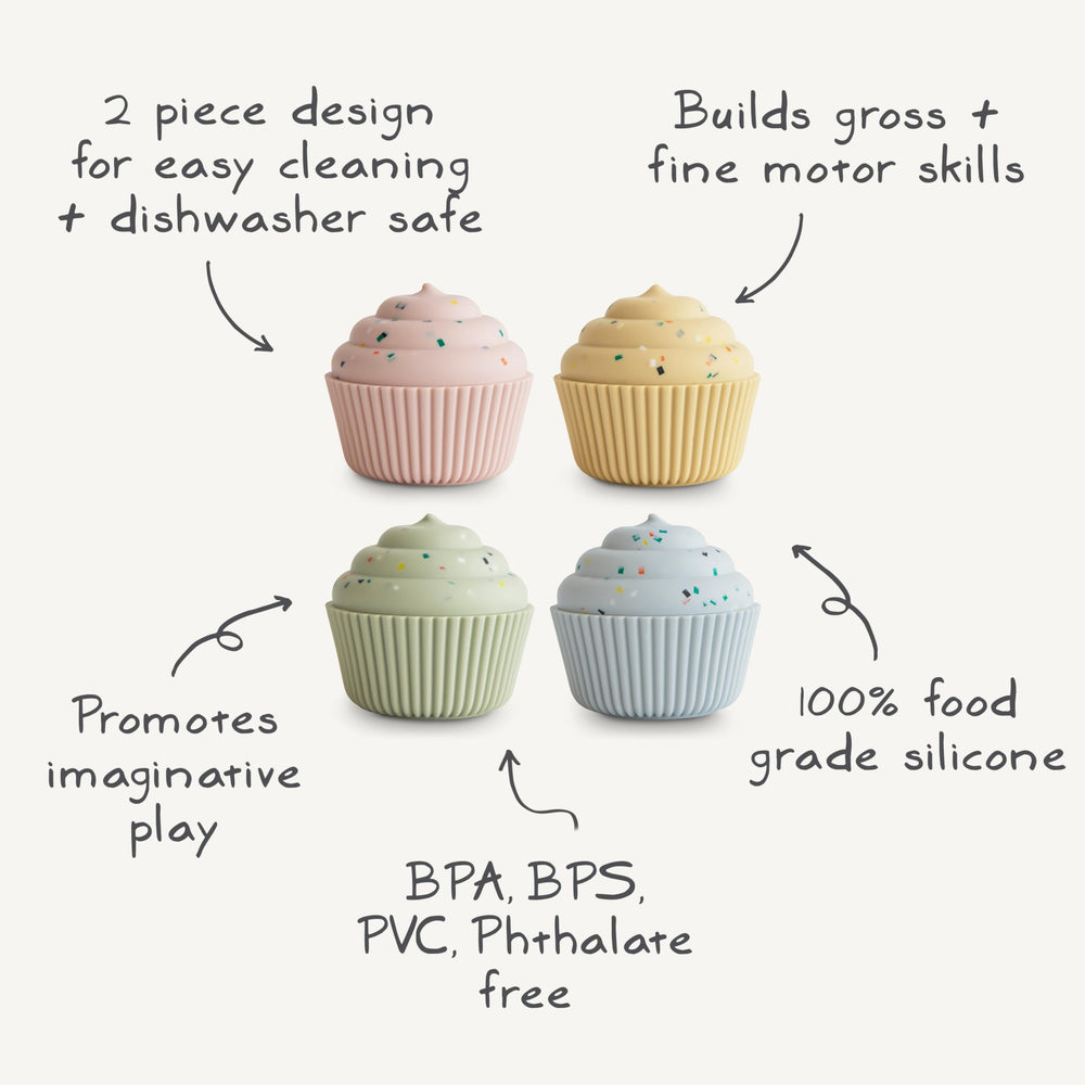 Mushie silicone cupcake toy four pack laid out for playtime routines