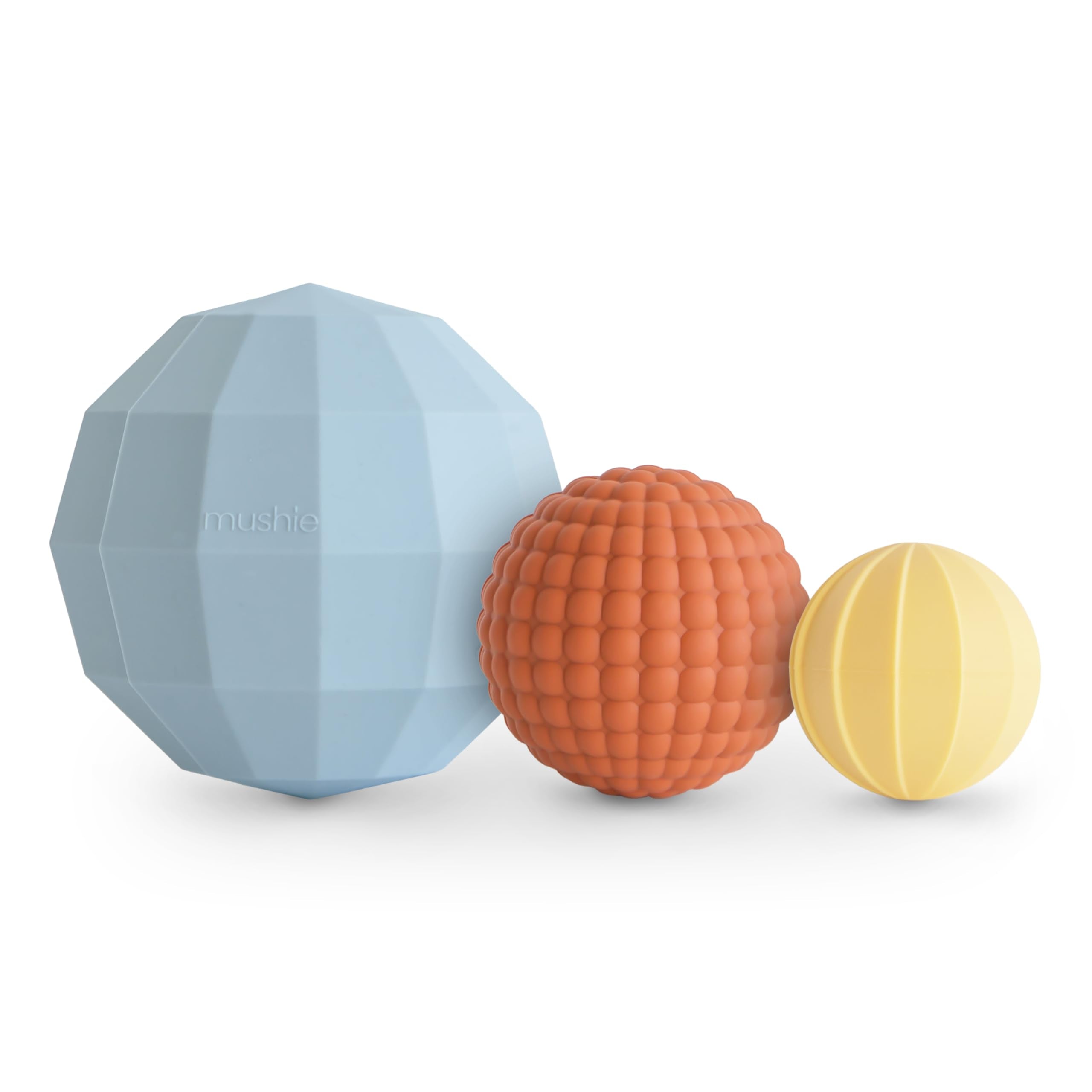 Mushie silicone nesting spheres powder blue show varied textures for infant tactile exploration
