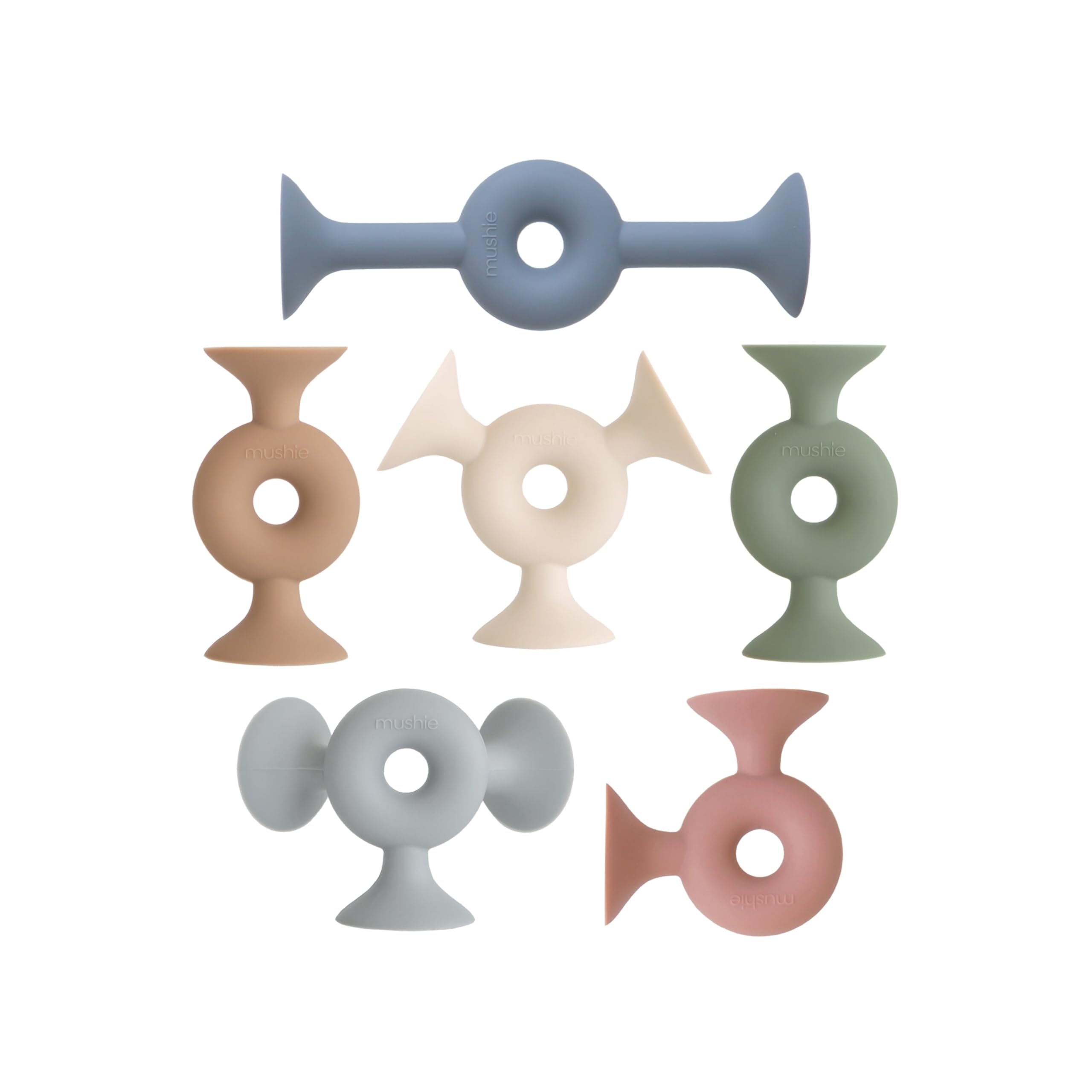 Mushie donut silicone suction builder pieces ready for creative stacking and play.