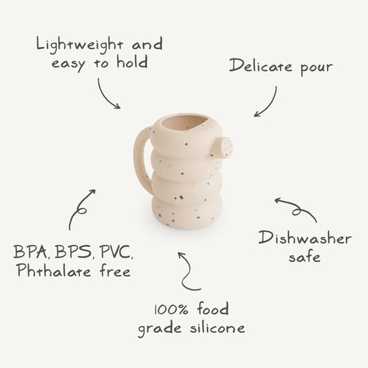 Mushie silicone watering can with soft silicone handle for easy grip during play