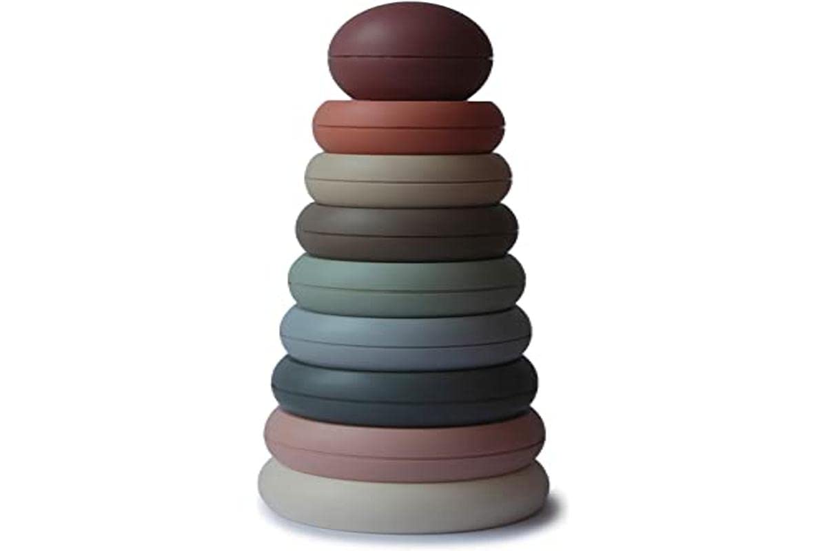 Mushie stack and sort rings pieces improve hand coordination during playtime.
