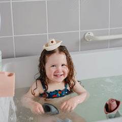 Mushie Stackable Bath Boats Packaged 01 displays the five-boat set ready for imaginative bath time.