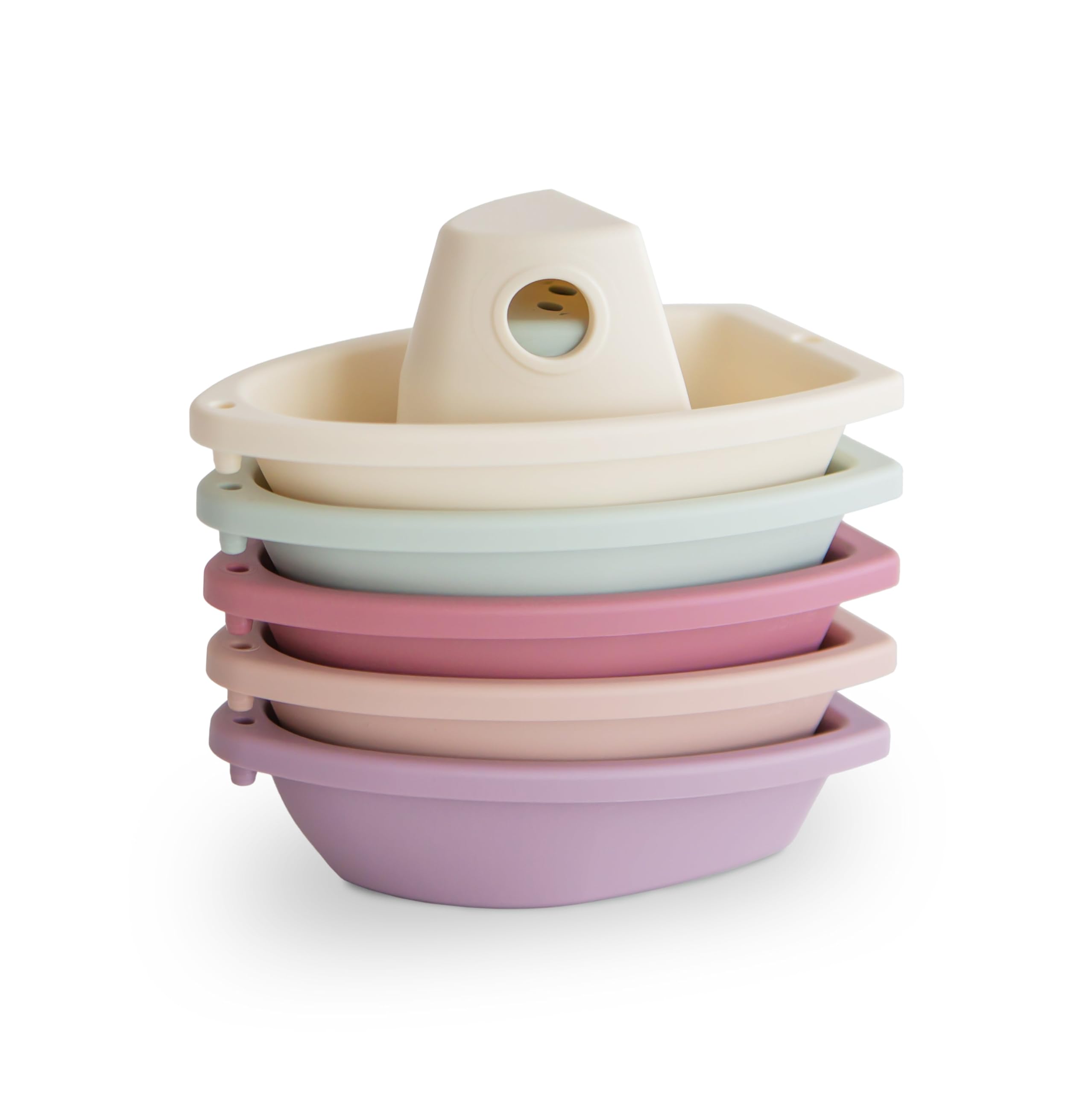 Mushie Stackable Bath Boats Petal 01 in use for imaginative bath train play and color exploration.