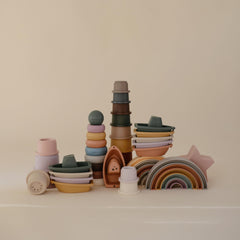 Mushie Stackable Bath Boats Petal 04 easy to clean after water play adventures.