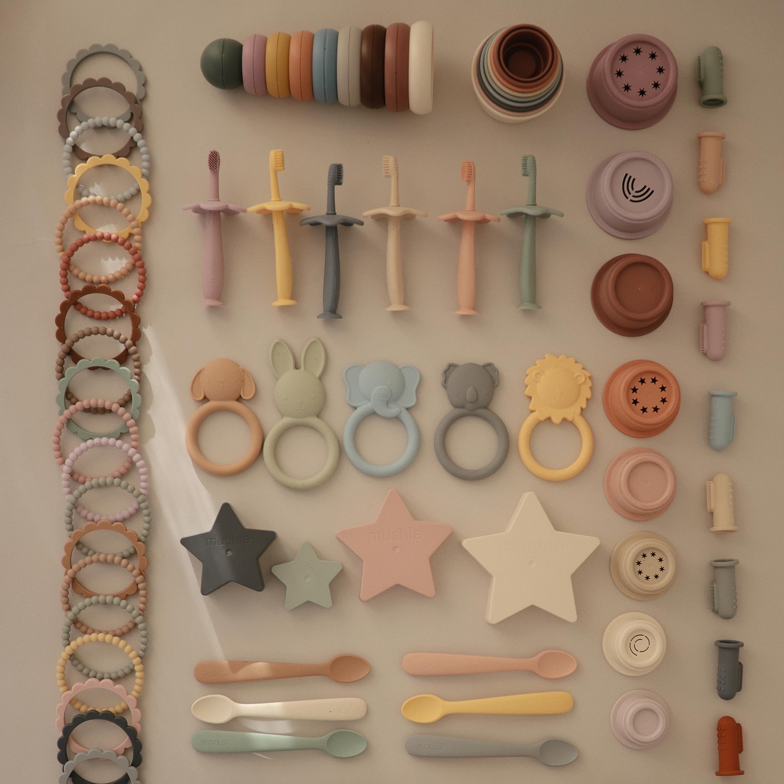 Mushie stacking cups forest Danish design: crafted in Denmark with gentle aesthetics and durable plastics.
