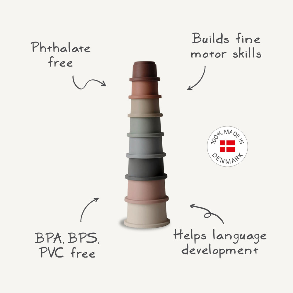 Mushie stacking cups forest tabletop play: enhances early playtime through shape and size differentiation.
