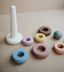 Mushie stacking rings collection set offers versatile play options