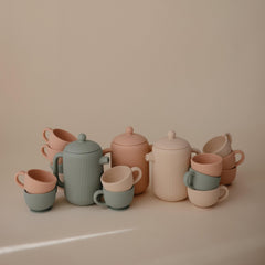 Mushie tea time playset shown with durable, food-grade silicone.