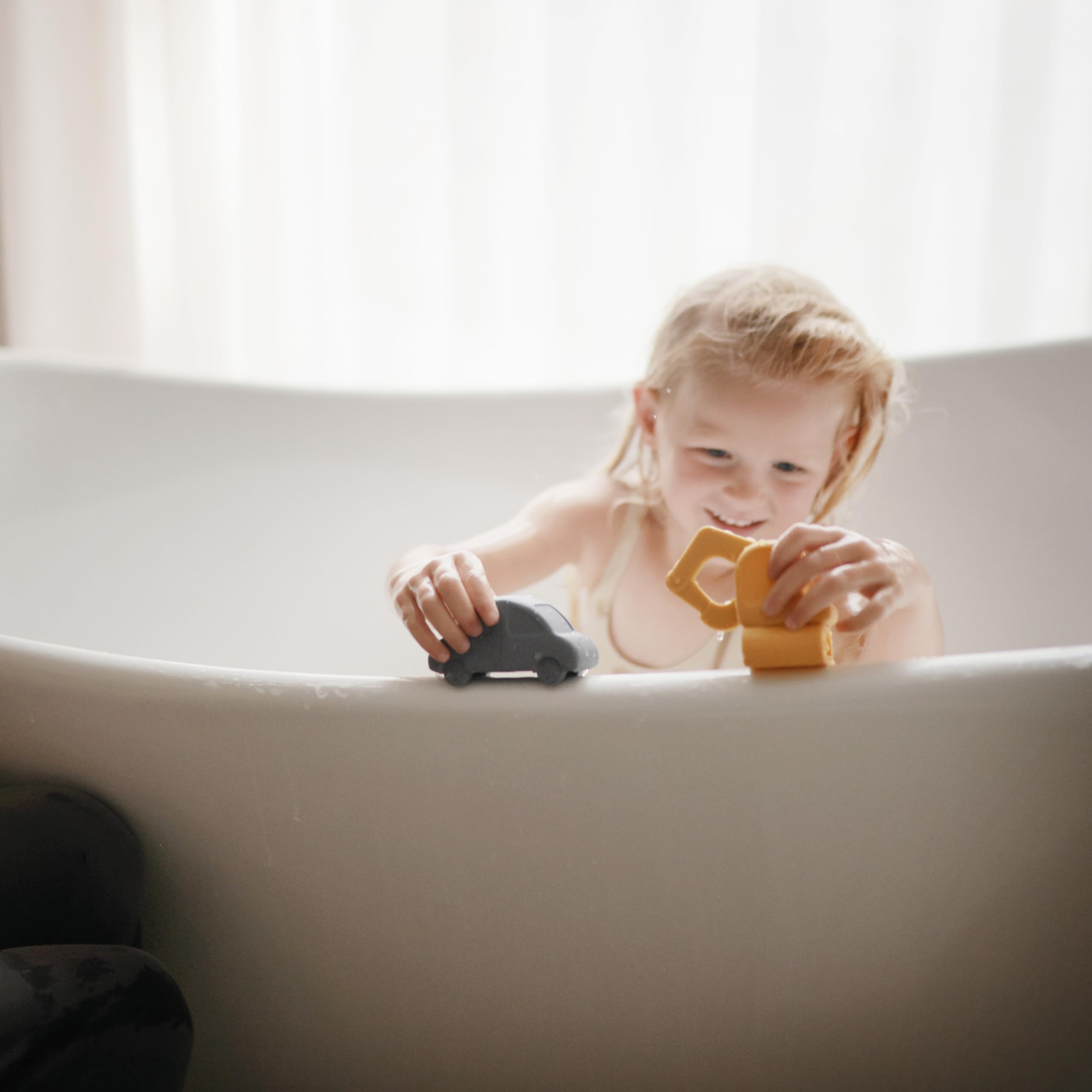Mushie opened-assembly bath toy: easy disassembly enables fast drying.