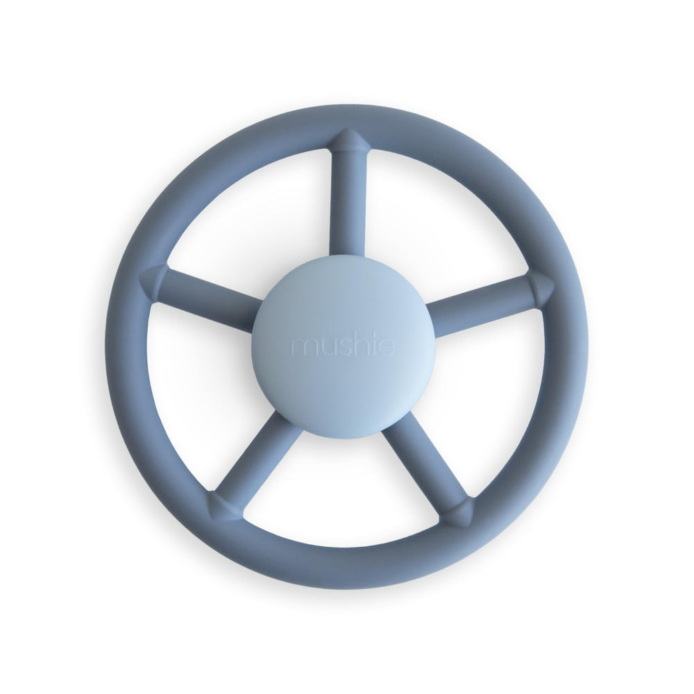 Mushie Wheel Suction Spinner Toy in bath with bright colors for bath time exploration